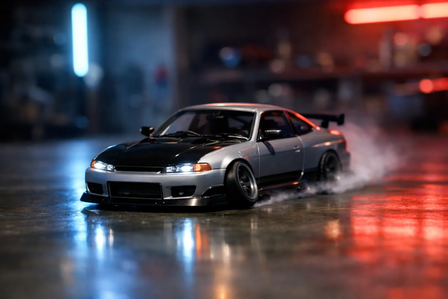 A small RC drift car sliding sideways on smooth polished concrete with its front wheels countersteering